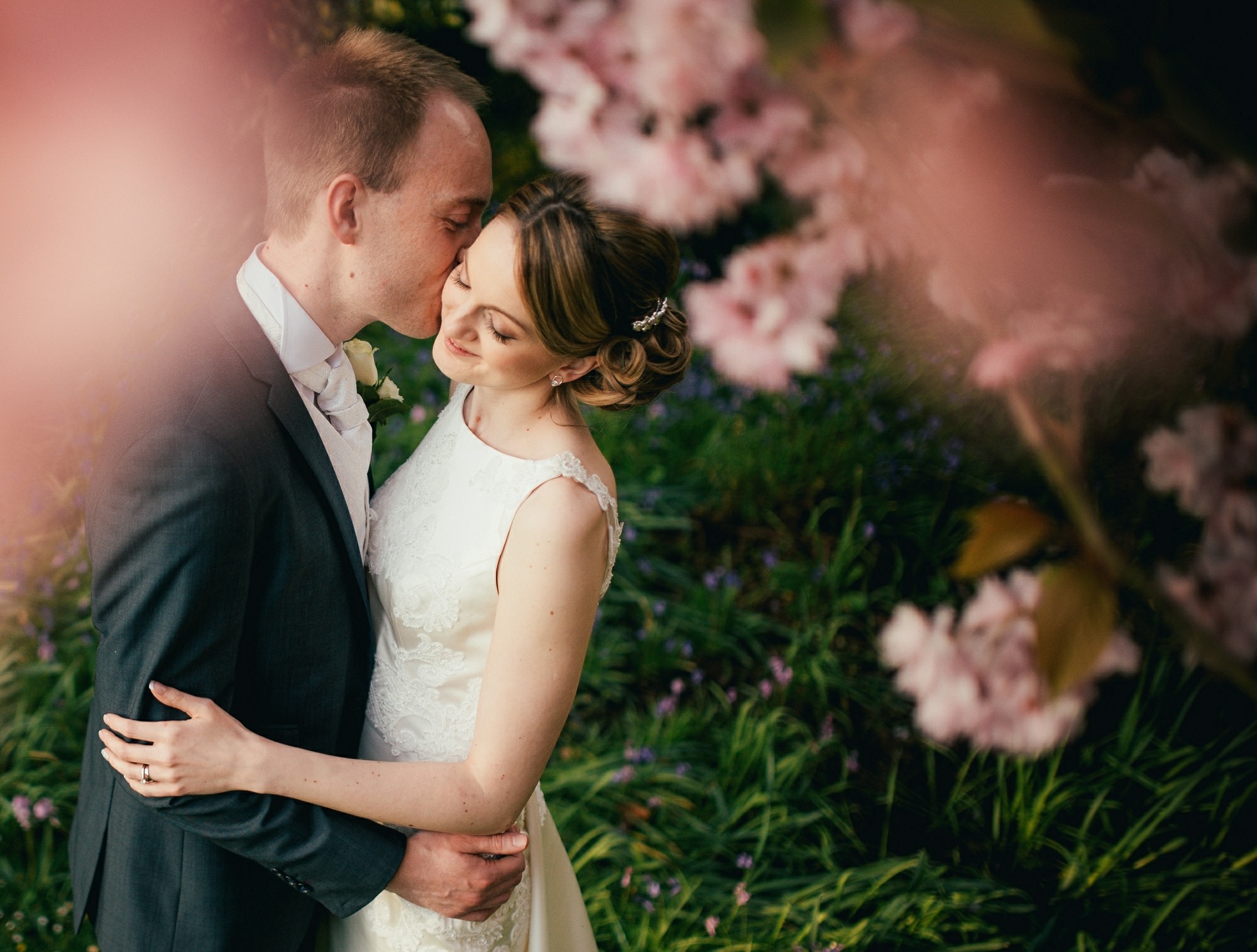 Abbeywood Estate Wedding Photographer Bride and Groom under blossom tree