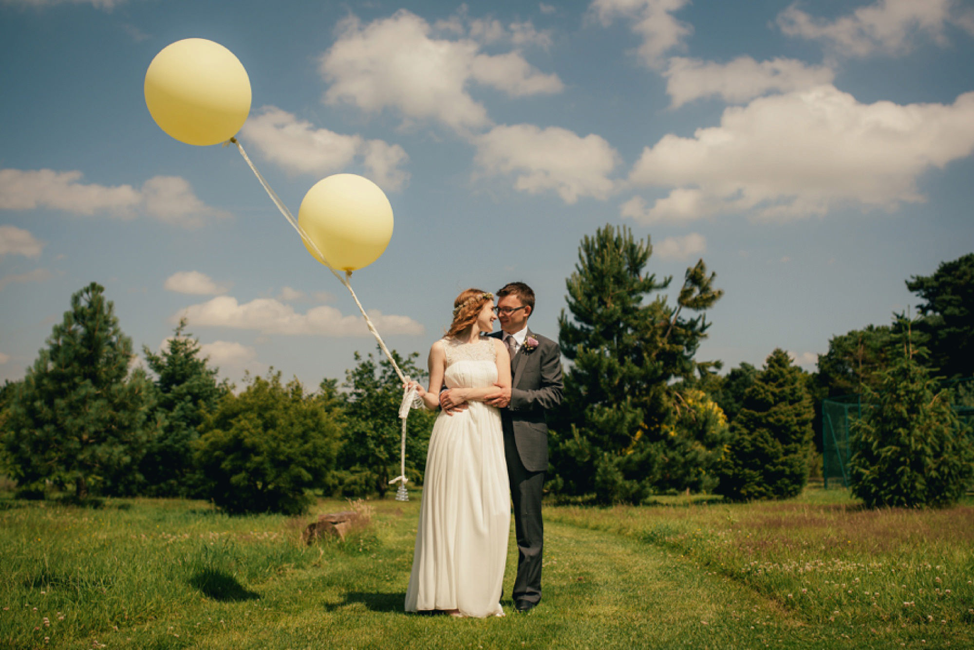Abbeywood Estate Wedding Photographer Bride and Groom with big yellow ballons
