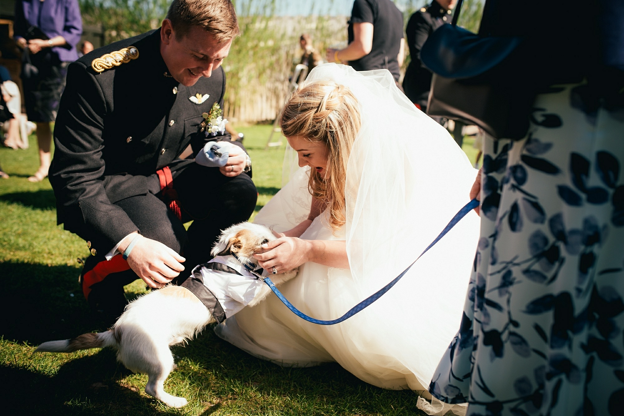 bride and groom with dog
