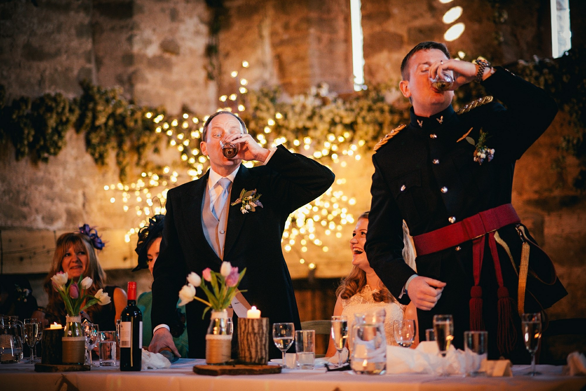 dad and groom shots before speeches 