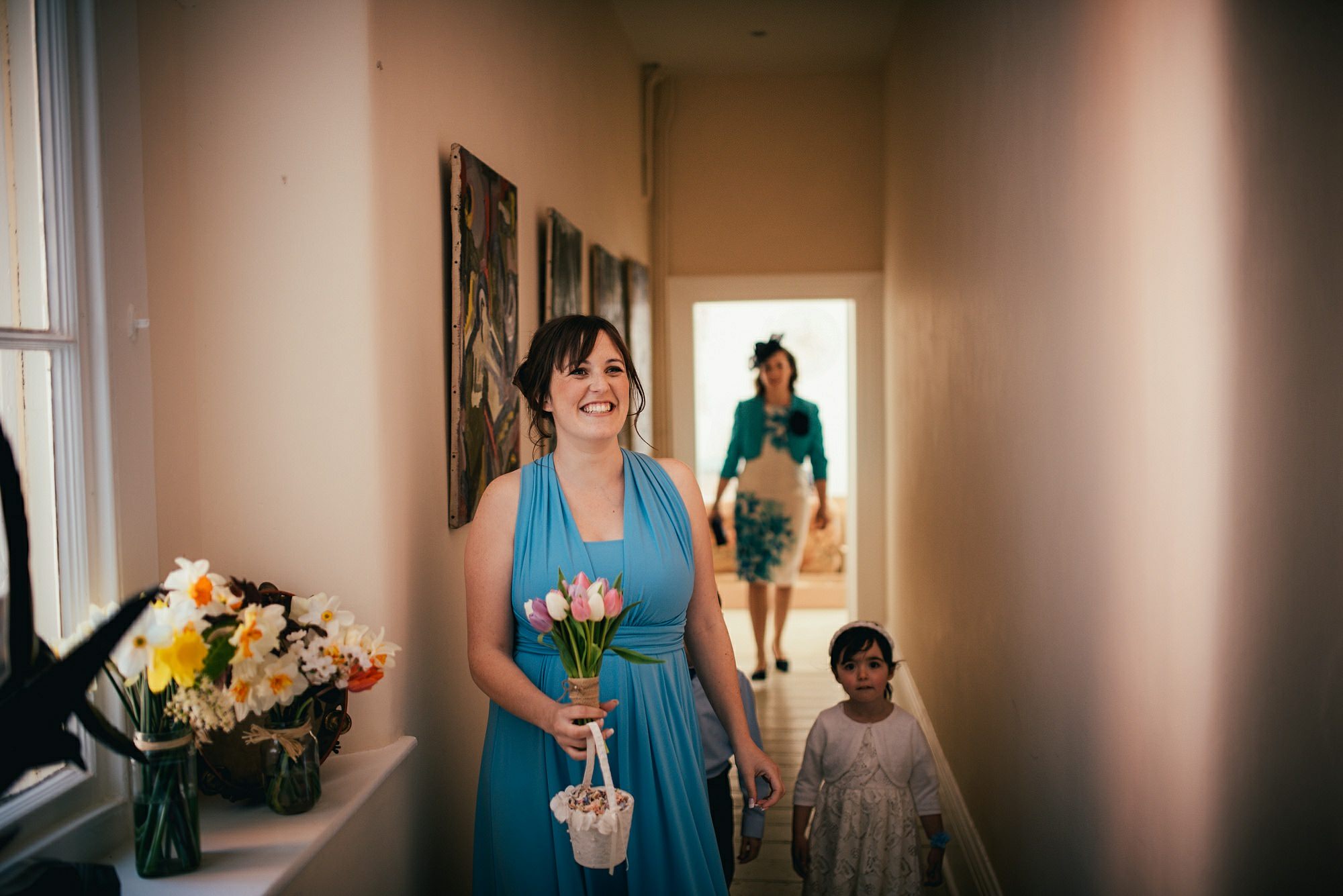 happy bridesmaid seeing bride
