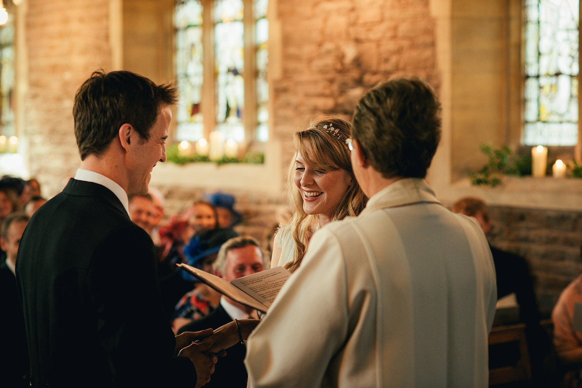happy bride during church ceremony 