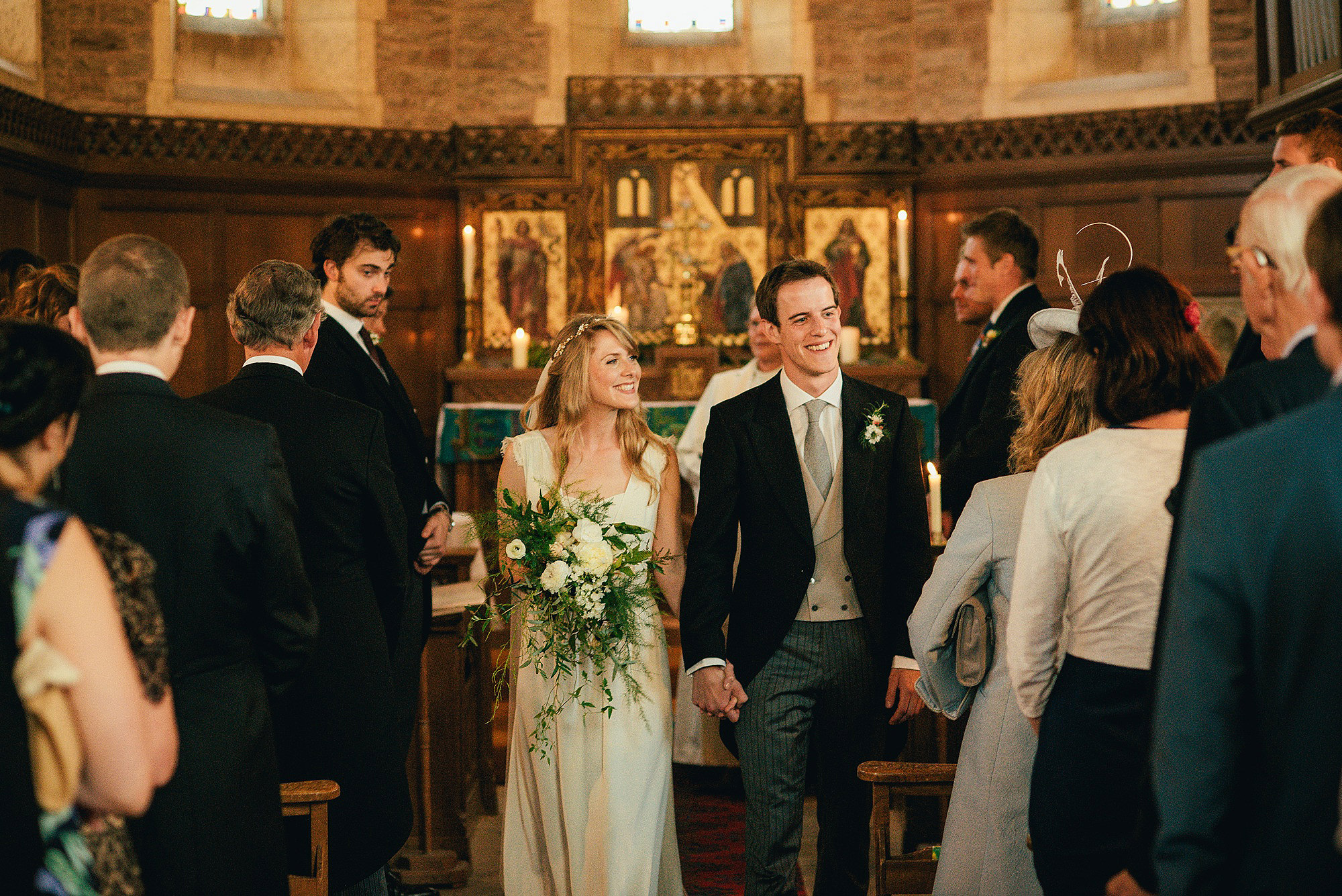 bride and groom happy exit from church