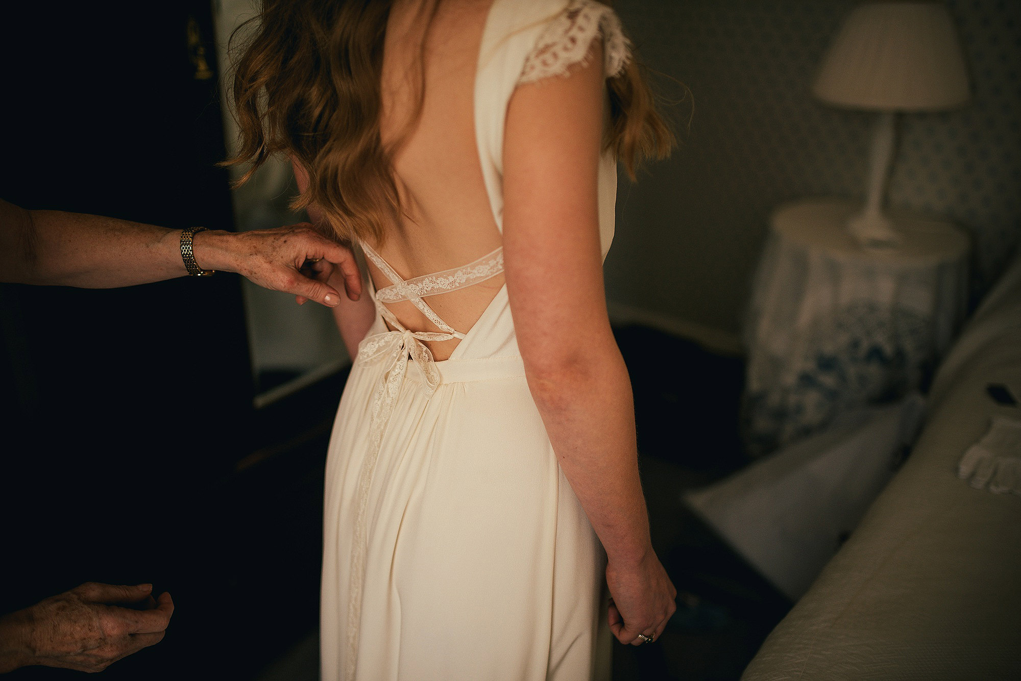 bride final dress fastening