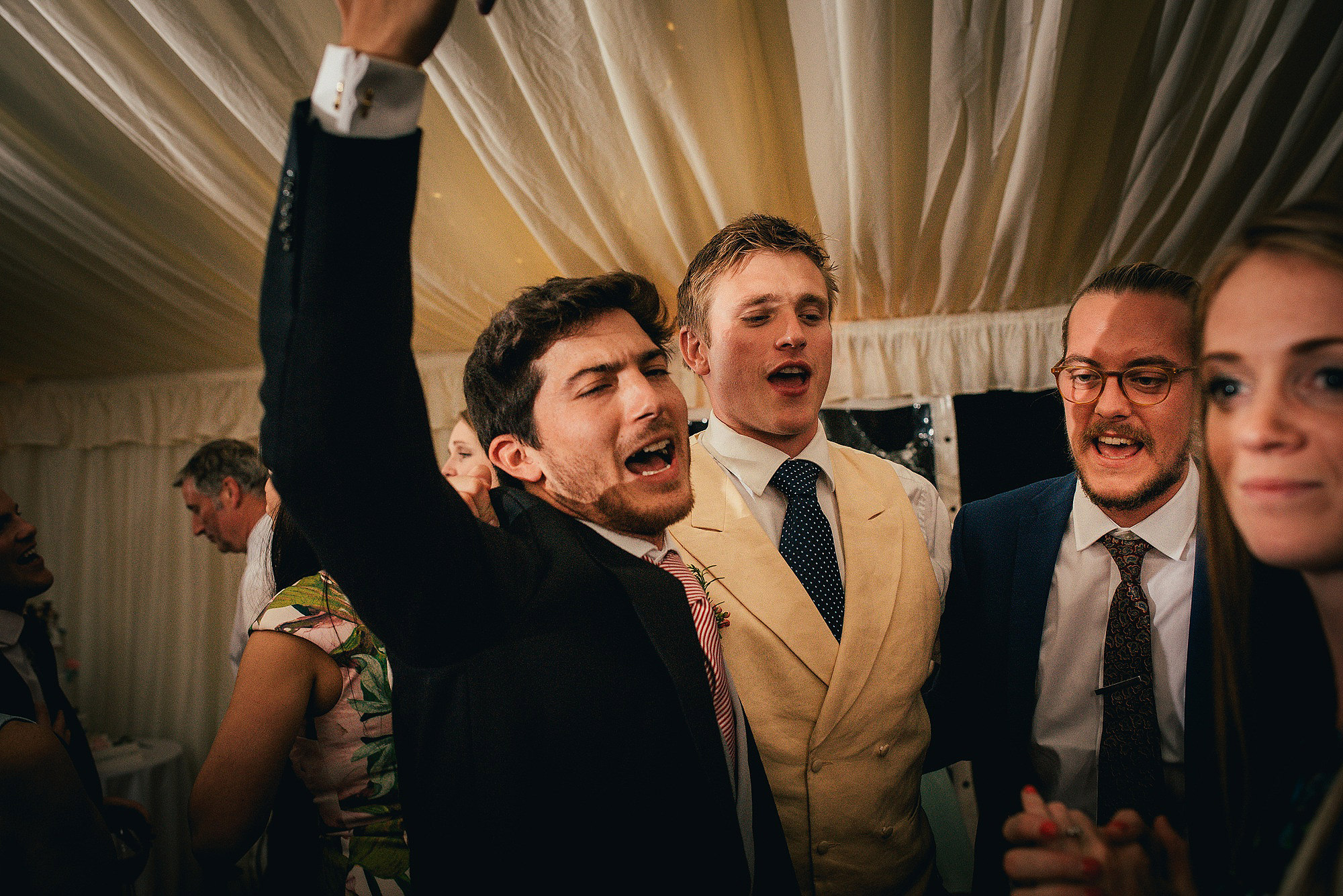 groomsman on dance floor at wedding